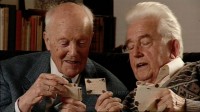 Dr. Thomas Meyer and Dr Hermann Grees, two schoolboy extras from Mein Leben für Irland, looking at photos from the shoot.